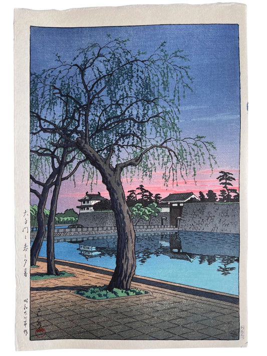 estampe japonaise lumière rose du soir sur le palais impérial de Tokyo