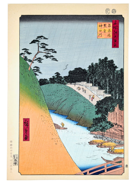 Estampe Japonaise d’Utagawa Hiroshige montrant une averse d’été sur la rivière Kanda avec le pavillon Yushima Seidō en arrière-plan.