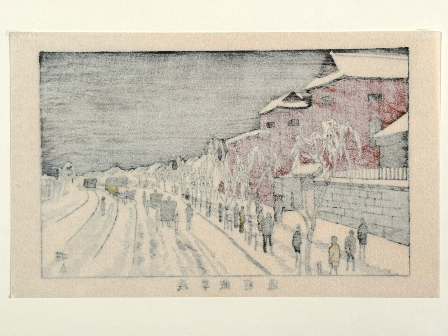 Estampe Japonaise de Yasuji Inoue représentant les bâtiments rouges de Kuramae à Asakusa sous la neige verso