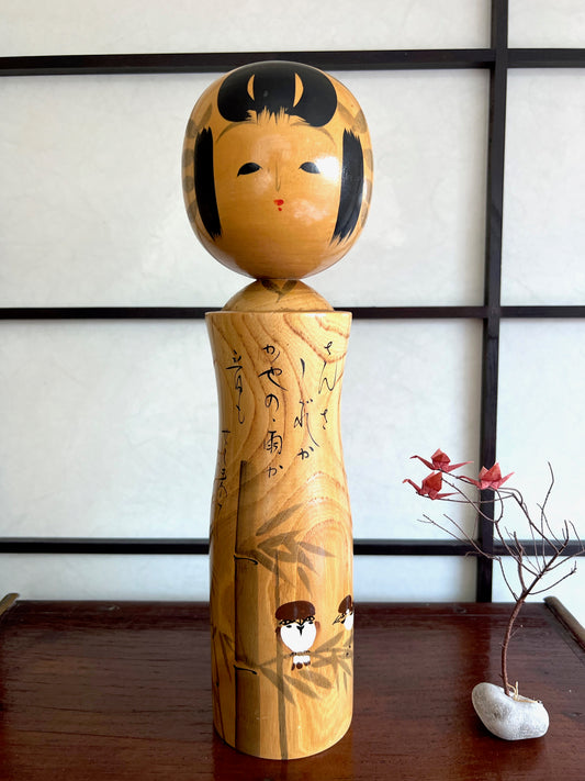 kokeshi motif moineau sur branche de bambou