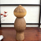 kokeshi de Watanabe Masao moine Mushin, vu de dos