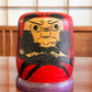 Kokeshi Daruma socle violet face