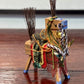 cheval traditionnel japonais en bois naturel, selle et parures multicolore