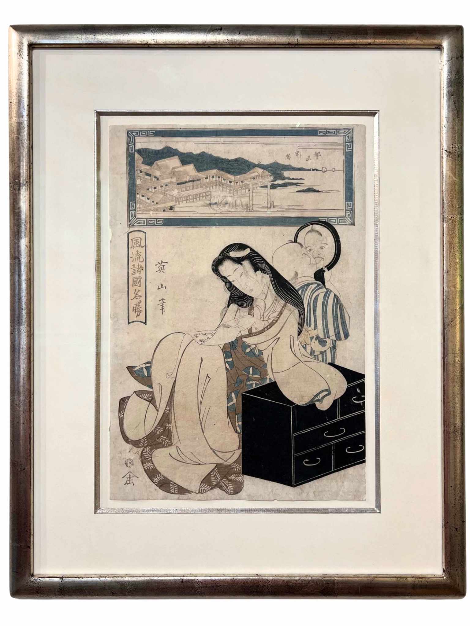 estampe japonaise de Eizan, une femme assise et son enfant faisant des grimaces devant un miroir, avec cadre doré à l'or blanc