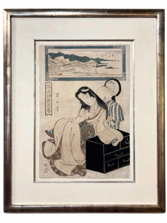 estampe japonaise de Eizan, une femme assise et son enfant faisant des grimaces devant un miroir, avec cadre doré à l'or blanc