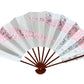 éventail traditionnel japonais argent et rose aux motifs paillettes et vagues blanches 
