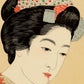 Estampe japonaise détail de l’estampe sur le visage de la femme les cheveux relevés