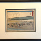 estampe japonaise encadrée de Hiroshige,  le Tokaido Kyoka station Kanaya. Des porteurs déposent bagages et voyageurs après avoir traversé la rivière, avec cadre noir