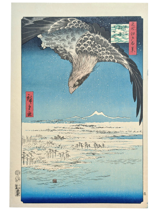 Estampe japonaise de Hiroshige représentant un aigle survolant les champs enneigés de Fukagawa avec le Mont Tsukuba à l’horizon.