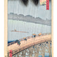 Estampe Japonaise d’Utagawa Hiroshige représentant une averse sur le pont Ōhashi et la rivière Sumida, célèbre pour la copie de Van Gogh.