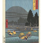 Estampe Japonaise de Hiroshige montrant des paysans dans des rizières sous la pluie avec le mont Daisen en fond