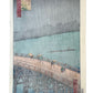 Estampe Japonaise d’Utagawa Hiroshige représentant une averse sur le pont Ōhashi et la rivière Sumida, célèbre pour la copie de Van Gogh, le verso de l'estampe