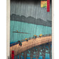 Estampe Japonaise d’Utagawa Hiroshige représentant une averse sur le pont Ōhashi et la rivière Sumida, célèbre pour la copie de Van Gogh.