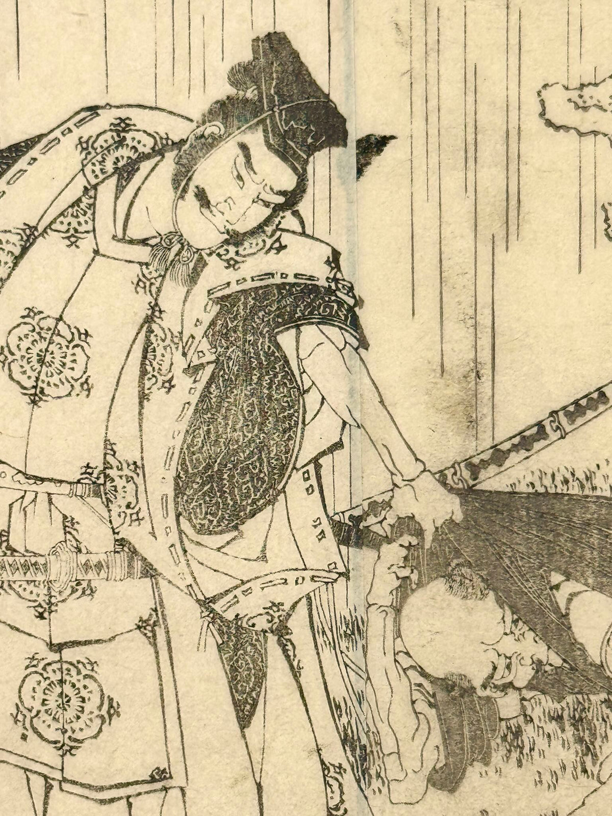 Estampe Japonaise de Hokusai représentant le samouraï Taira no Tadamori capturant un moine, gros plan sur le visage du samouraï