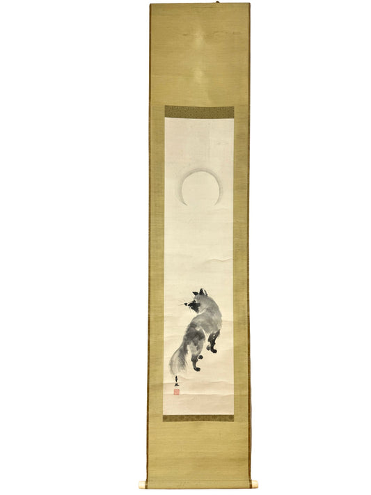 akejiku de Mochizuki Kinpō représentant un tanuki sous la lune.