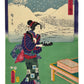 estampe japonaise de Hiroshige et Kunisada, série Tokaido à deux pinceaux, une femme en kimono coloré porte un plateau avec des tasses de saké, en fond paysage de neige.