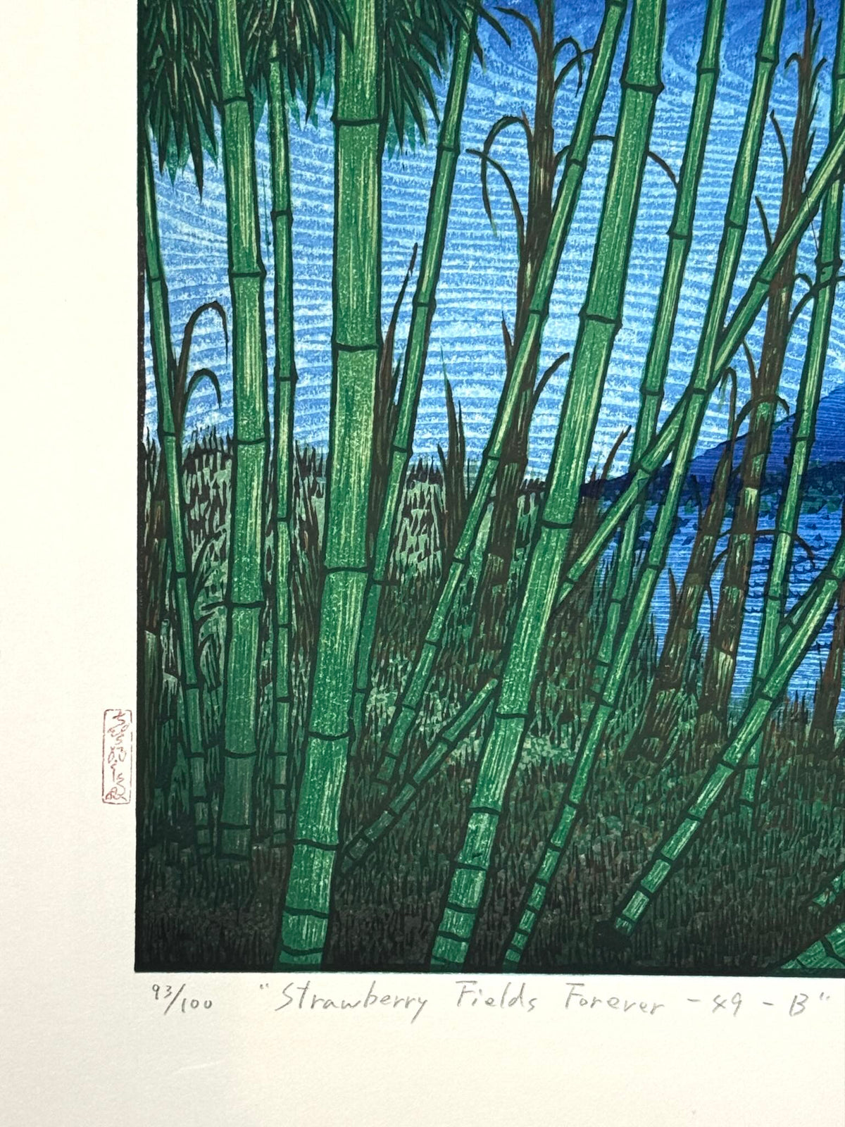 Estampe Japonaise de Kinoshita Taika représentant le mont Fuji la nuit derrière une forêt de bambous, détail du titre, du numéro de l'oeuvre et du sceau de l'artiste