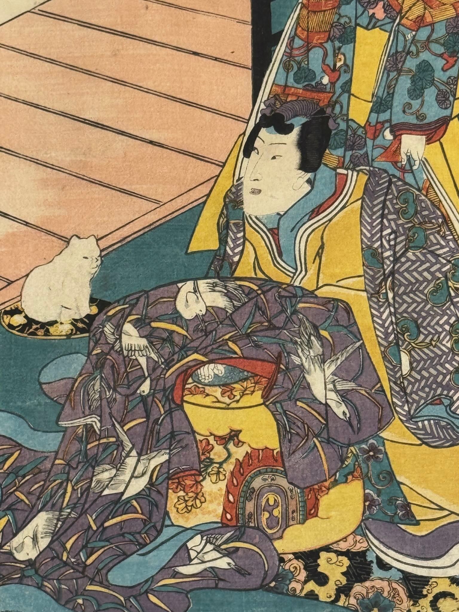 Estampe Japonaise triptyque de Kuniyoshi représentant des courtisanes sous la neige, habillées de kimonos colorés, détail d'un seigneur accompagné d'un chat blanc