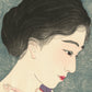 estampe japonaise femme s'ppliquant de la poudre blanche sur le cou, gros plan sur le délicat visage