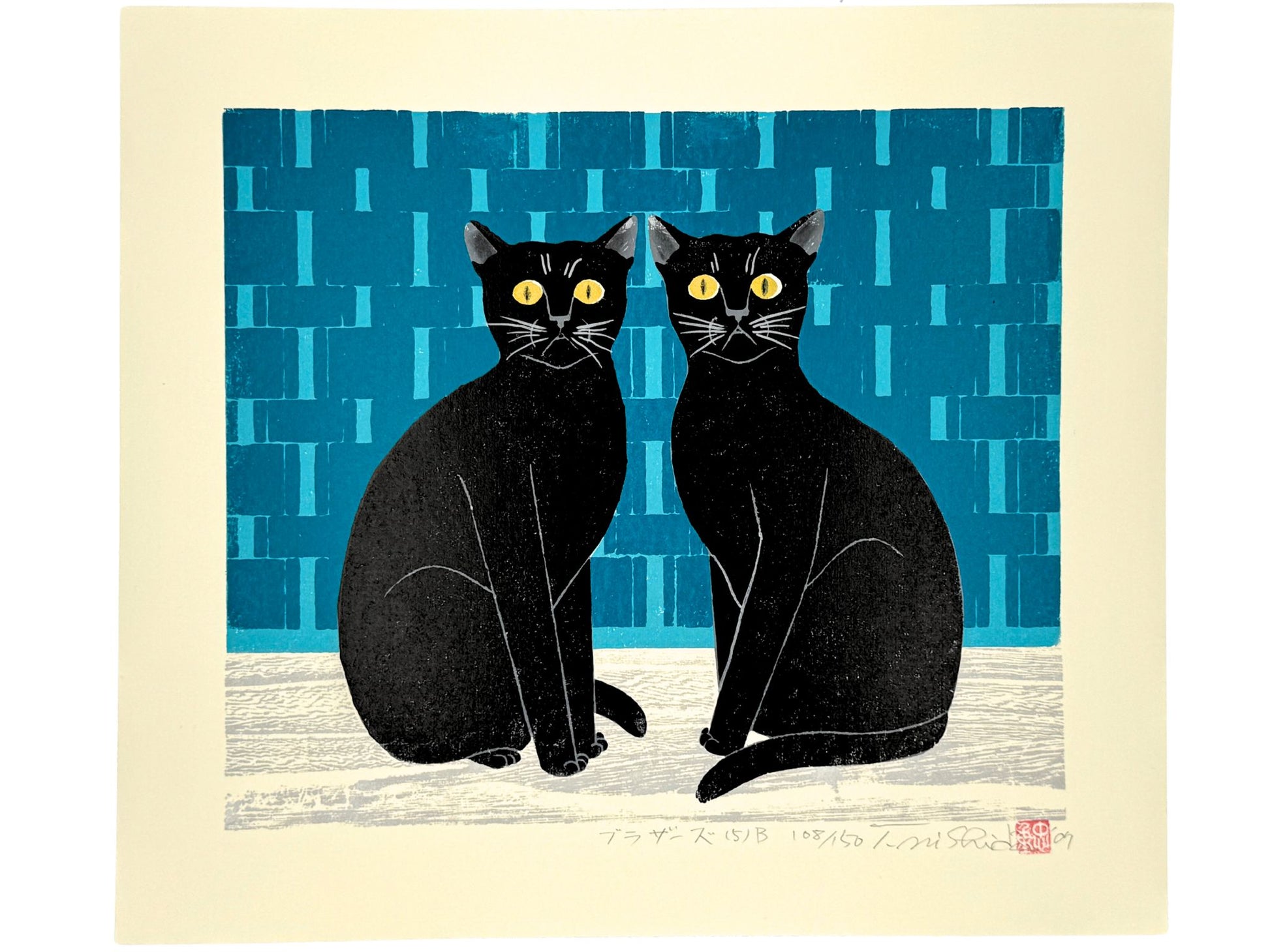 Estampe japonaise de Nishida représentant deux chats noirs sur fond bleu géométrique 