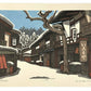Estampe Japonaise de Nishijima Katsuyuki représentant l'auberge Ikomaya sous la neige dans le quartier historique de Tsumago-juku sur la route du Kisokaidô