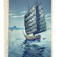 estampe japonaise un voilier sur la mer la nuit