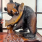 ours ainou poisson sur socle face