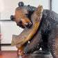 ours ainou poisson sur socle detail tete