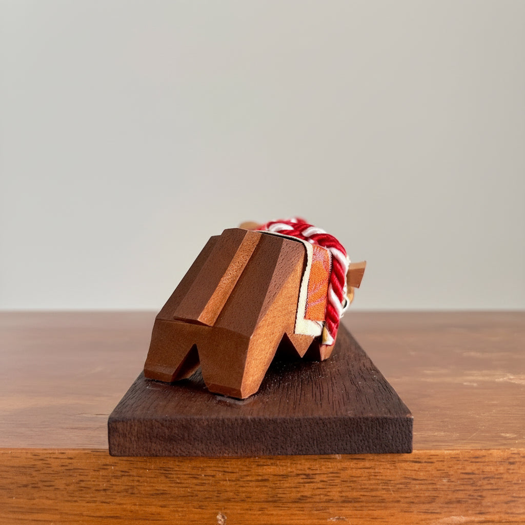 deux buffles sur socle détail arroère