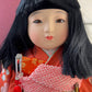 Poupée Japonaise Traditionnelle  Ichimatsu | Jeune fille en kimono orange fleuri tête yeux en verre