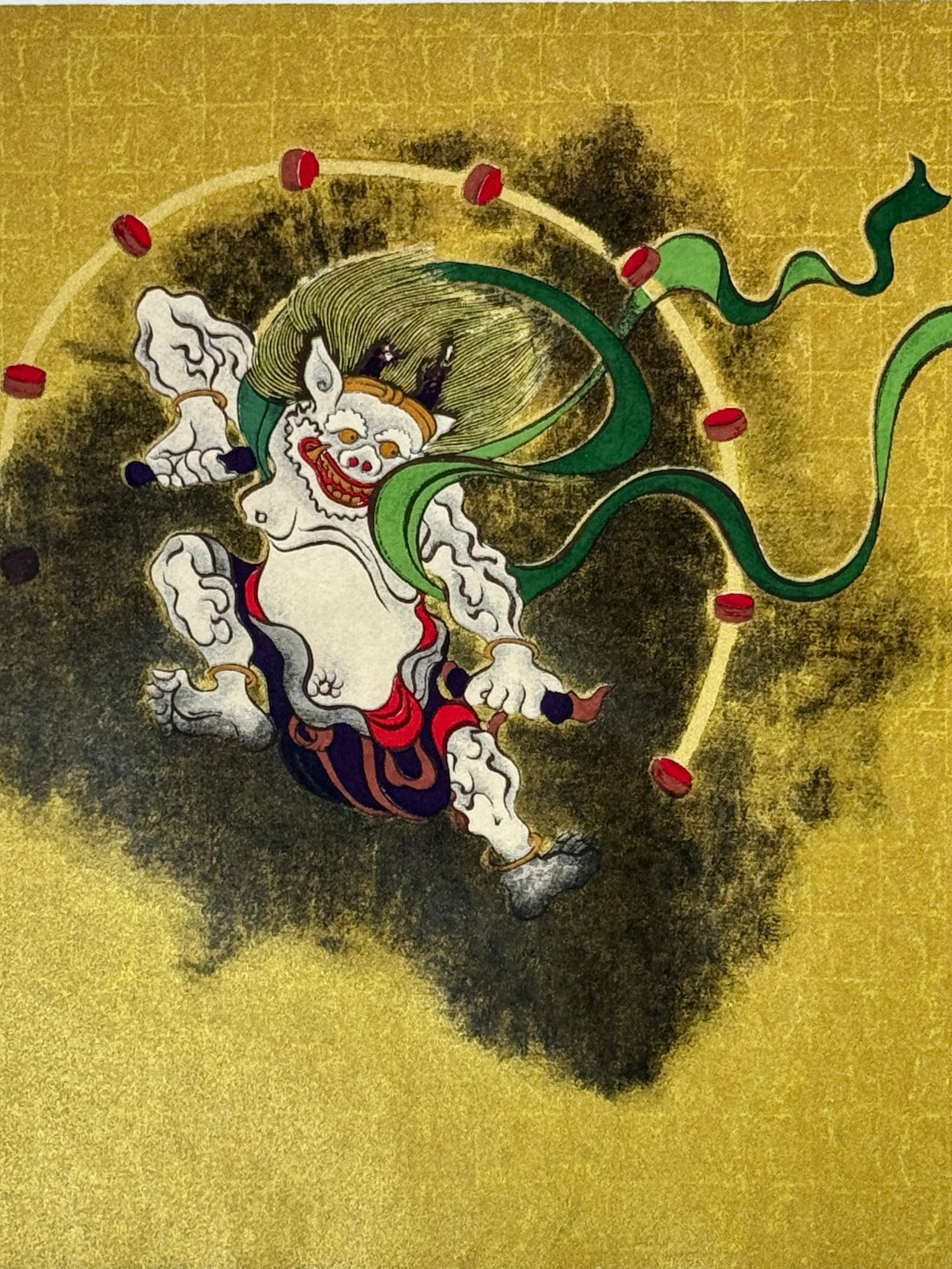 Estampe japonaise Raijin et Fujin sur fond doré, gros pla sur le dieu du Tonnerre Raijin