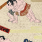 Sérigraphie japonaise de lutteurs de sumo en habits cérémoniels, gros plan sur deux sumo luttant corps à corps