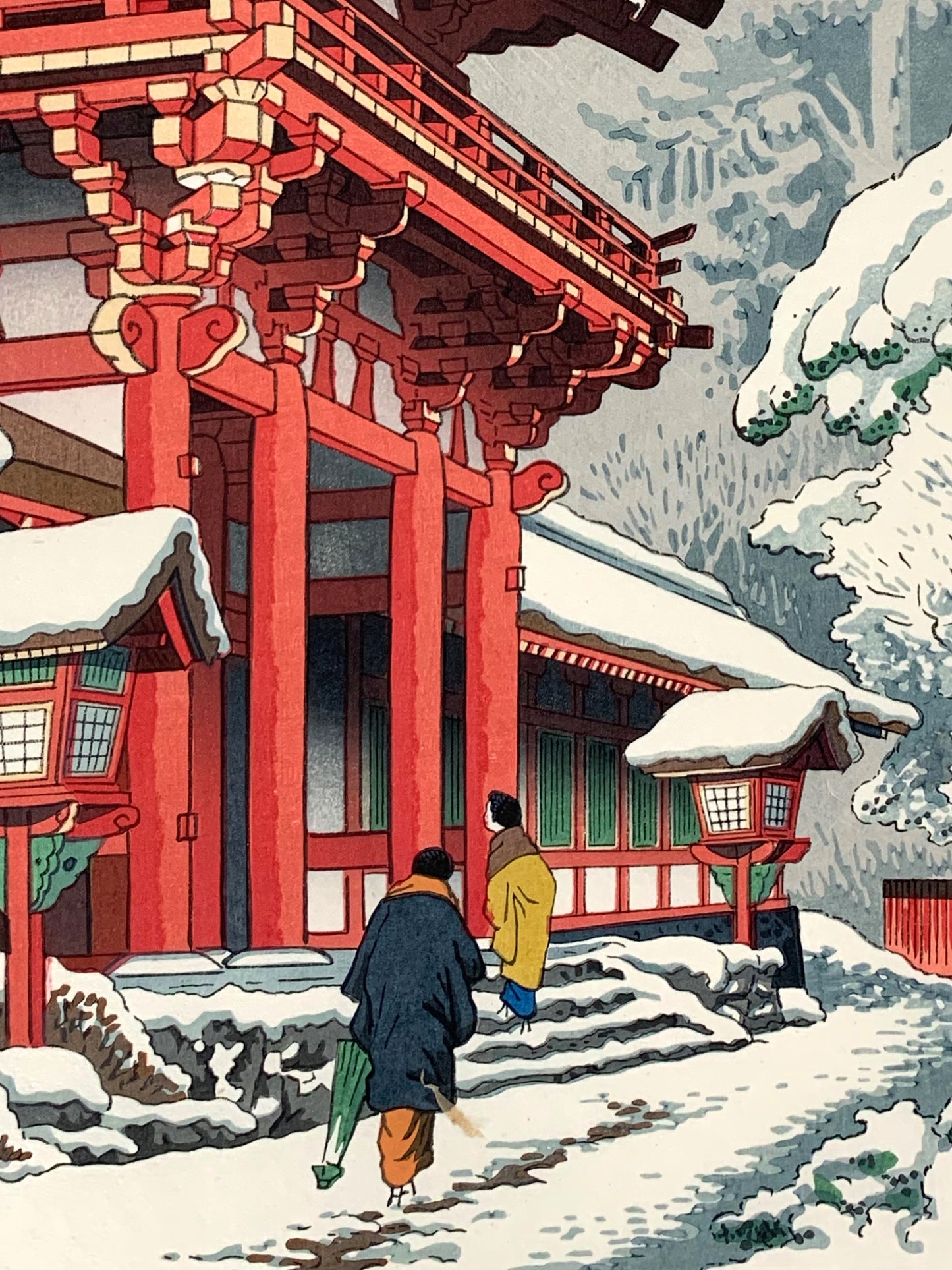 estampe japonaise paysage de neige, temple rouge à Kyoto, deux personnes devant l'entrée