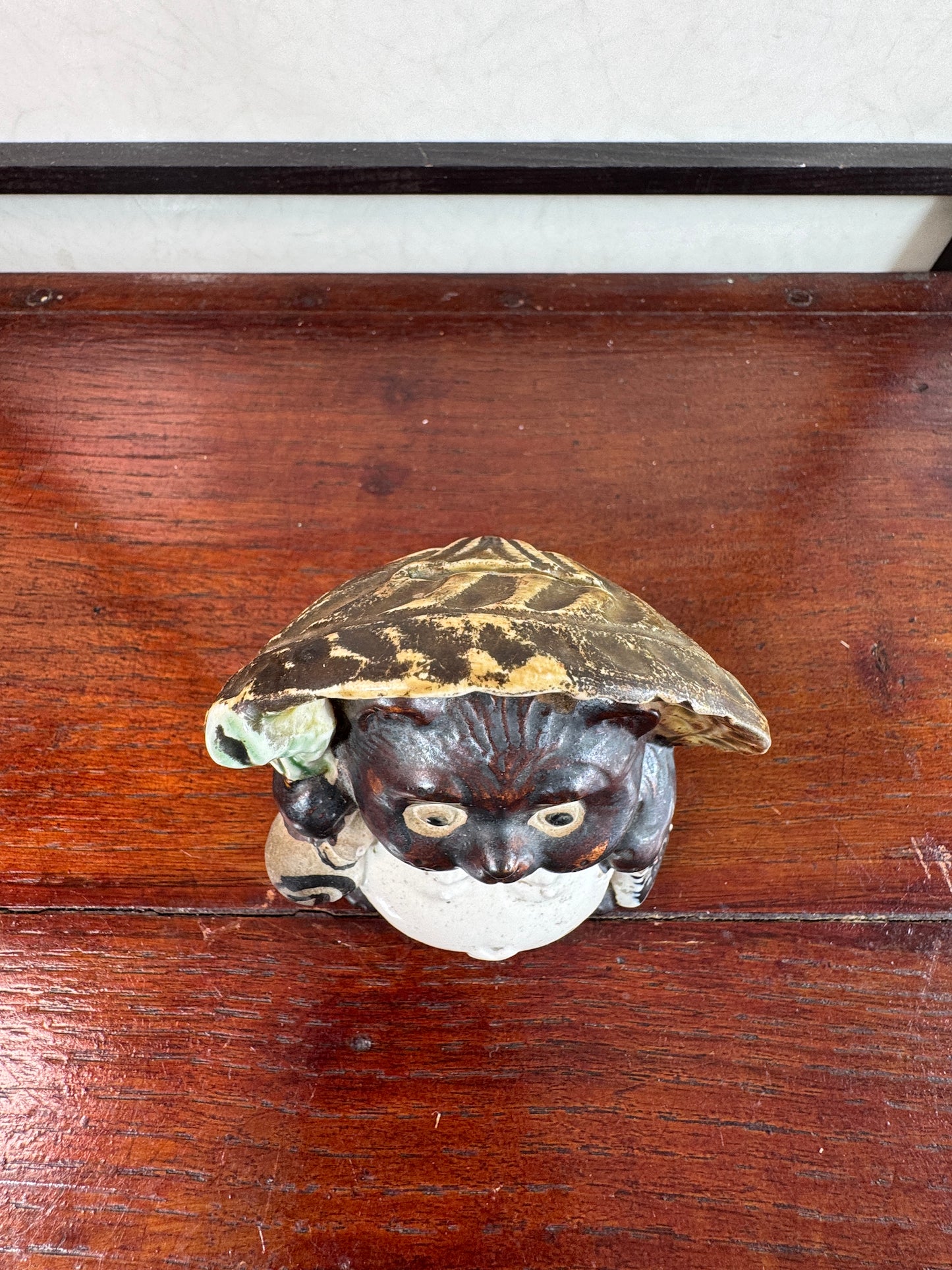 tanuki en céramique vu de dessus