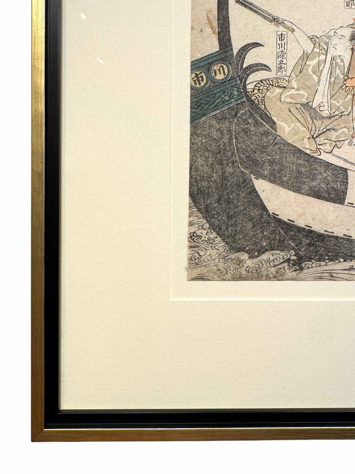 estampe japonaise encadrée de Toyokuni 1 Utagawa, des hommes et courtisanes en kimono en promenade en bateau. Gros plan sur l'angle du cadre noir et or.