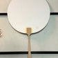 eventail Uchiwa vert avec fleur de lotus découpée, le verso
