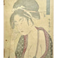 estampe japonaise geisha un sein nu, cure dent dans la bouche, dos de l'estampe