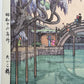 Coin inférieur gauche de l'estampe, pont japonais et glycines, date en japonais, titre en japonais et en anglais.