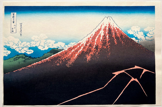 estampe japonaise Hokusai le Mont Fuji sous l'orage, des éclairs zèbrent son flan