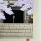 estampe japonaise le temple Kurama apparait une nuit de pleine lune derrière des branches de cerisiers en fleurs, le sceau de l'artiste