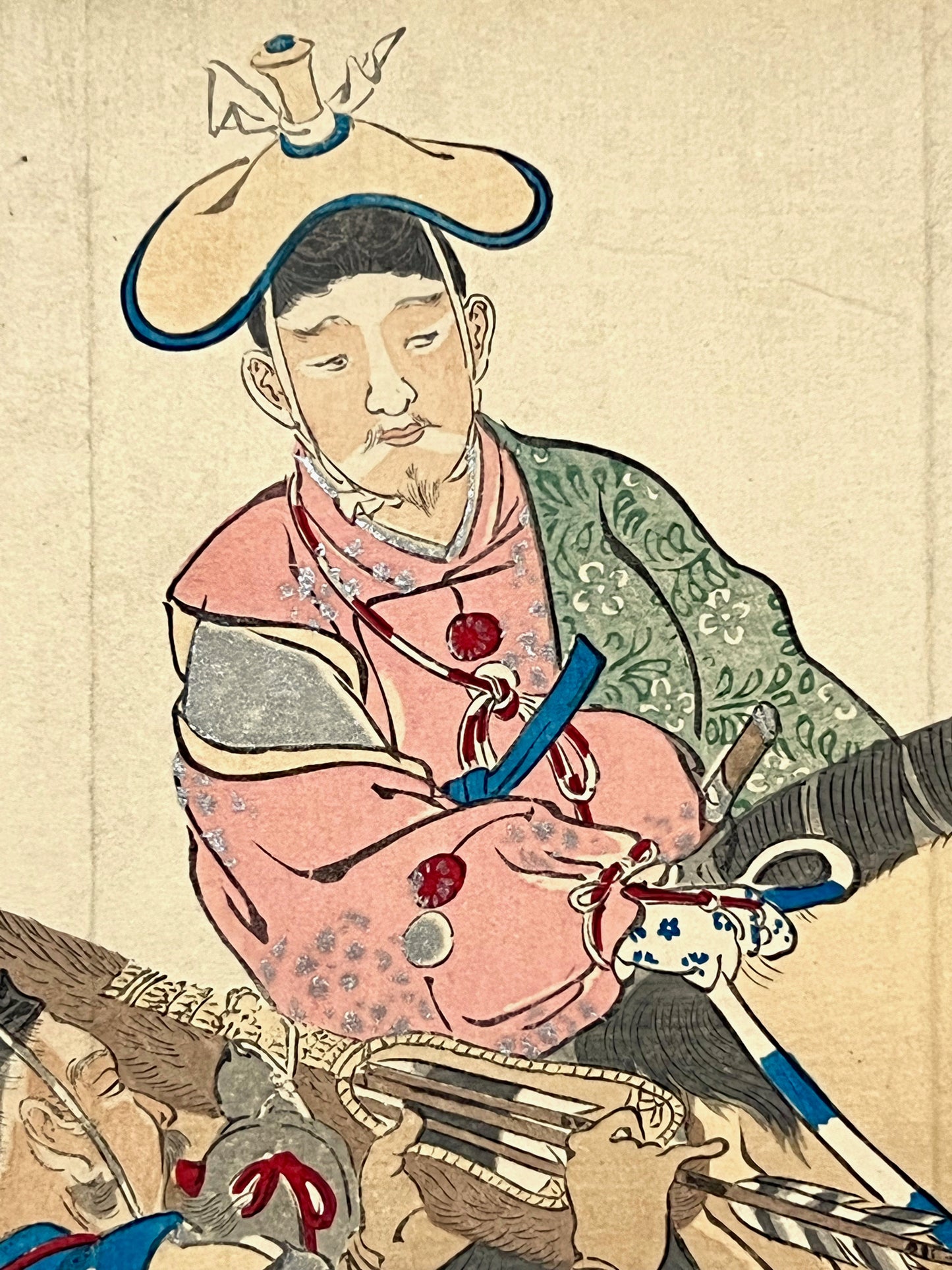 estampe japonaise shogun sur un cheval avec arc et flèche, gros plan sur le shogun