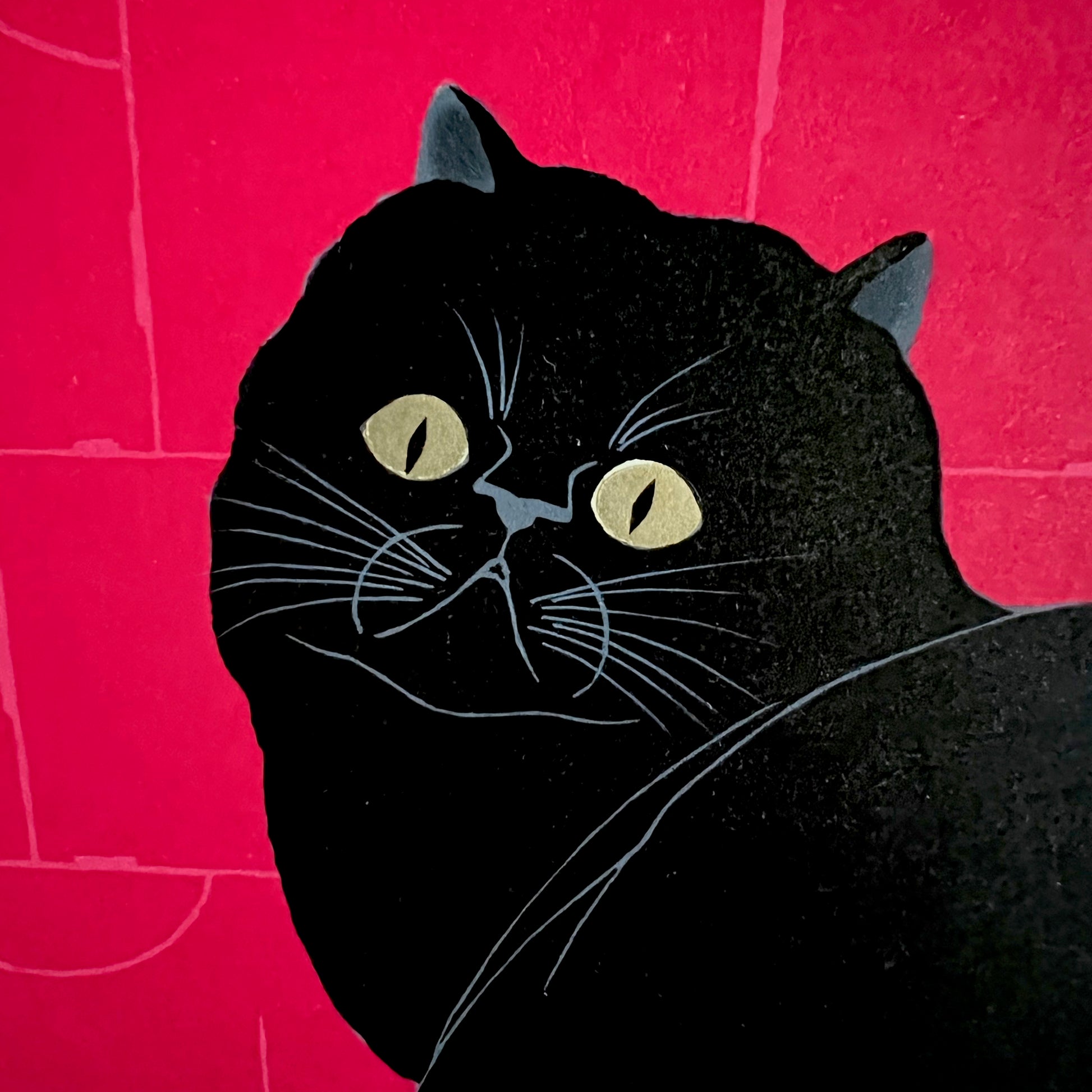 Estampe de Nishida Tadashige look back chat noir, gros plan sur l tête du chat et ses yeux or