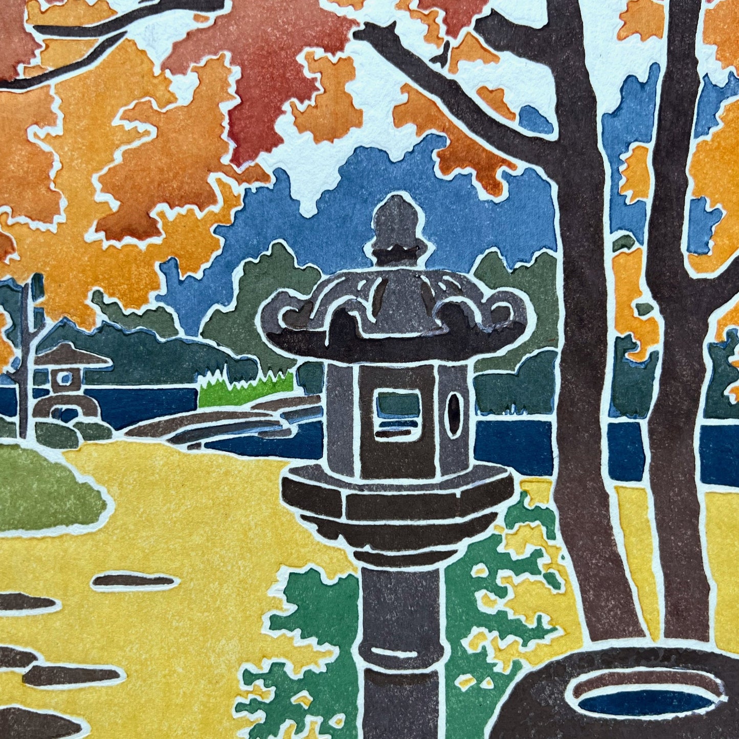 estampe japonaise de yoshida toshi deux lanternes en automne, gros plan sur le lanterne en pierre